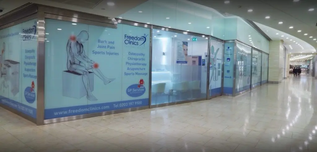 View of the glass walls of Freedom Clinics in Canary Wharf, London.